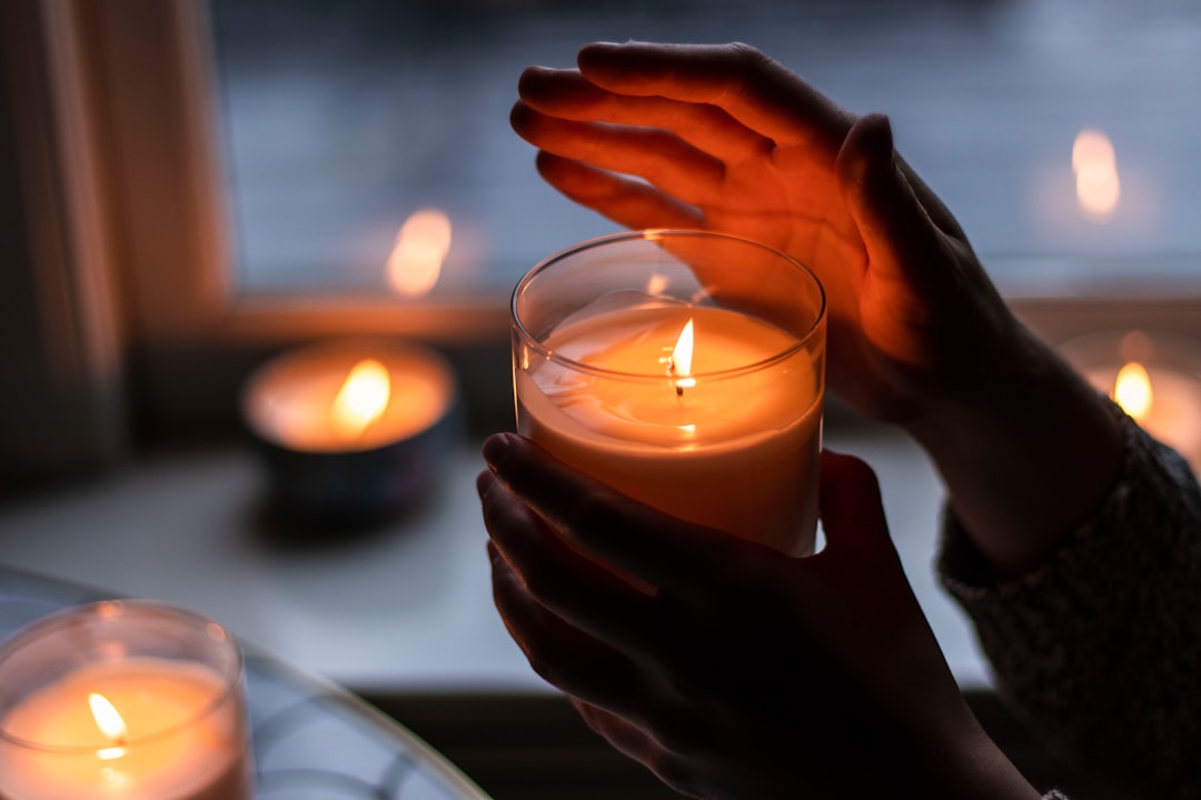 @thevibrantmachine holding candle in october